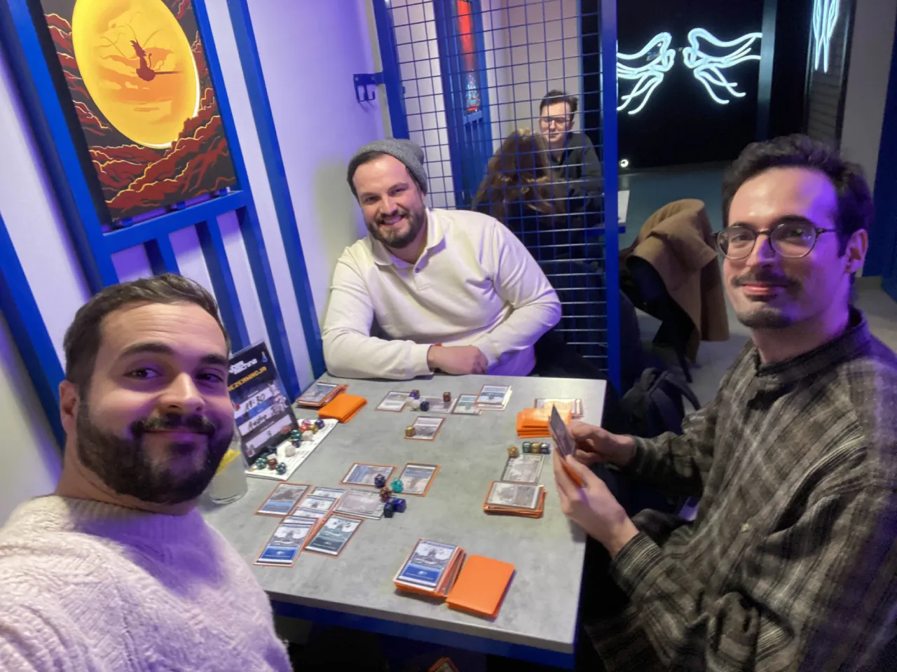 Kravestorm playtest session with three players around a table
